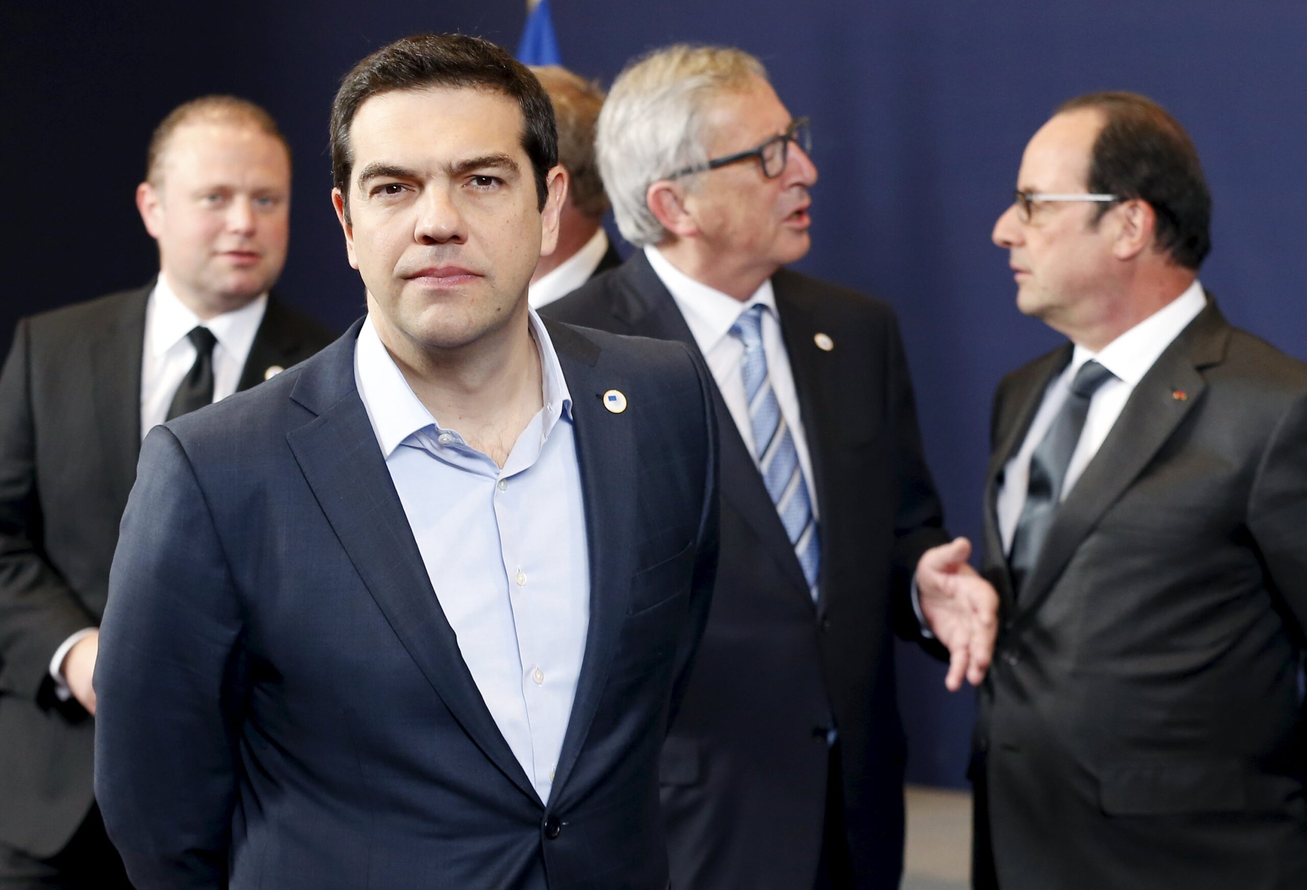 Greece's PM Tsipras, Malta's PM Muscat, EU Commission President Juncker and France's President Hollande attend an EU leaders summit in Brussels